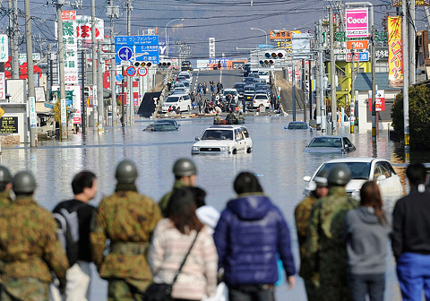 Kyodo, Reuters / Landov